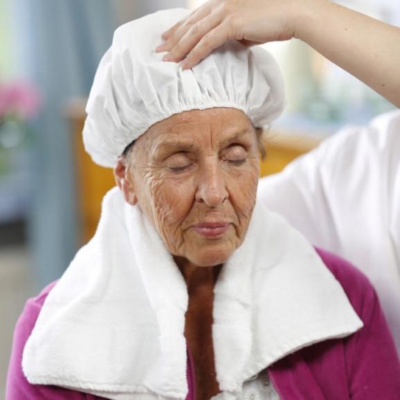 TENA Proskin Shampoo Cap – czepek do mycia włosów (1 sztuka) - zdjęcie produktu